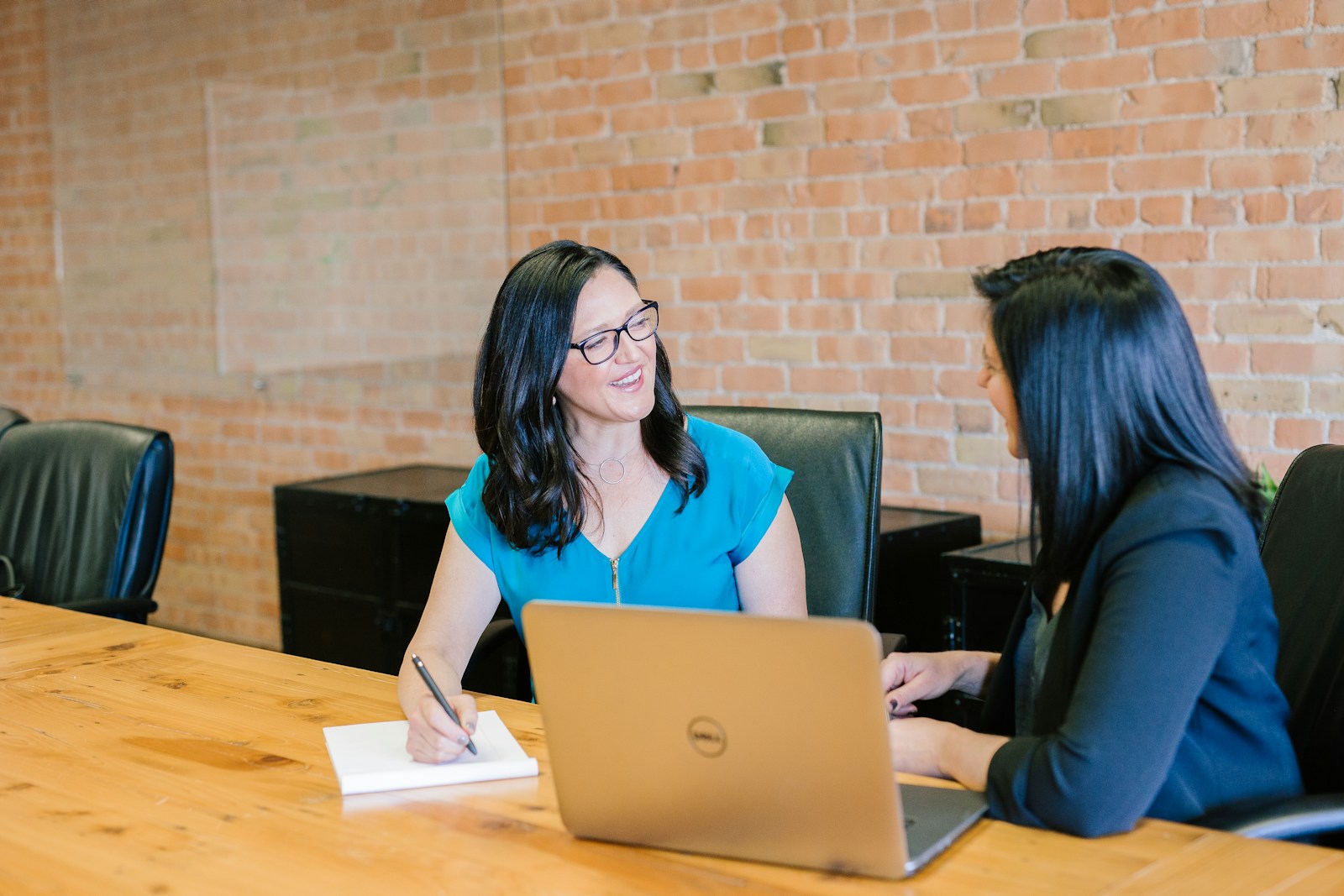 Facilitator guiding a small group through a finance AI hygiene drill